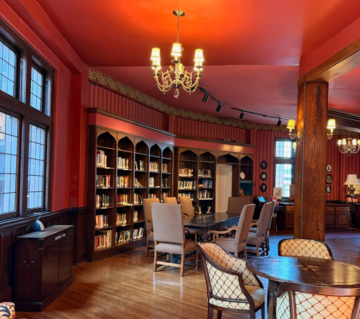 View from armchair of the many-sided library room